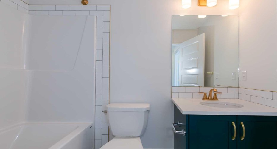 One of the two upper-level bathrooms, perfect for family and guests!