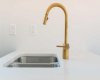 This modern kitchen faucet adds a touch of elegance to your culinary space