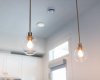 These elegant pendant lights add a warm flow to your eating kitchen bar