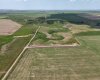 Drone view of Property surrounded by prairie.