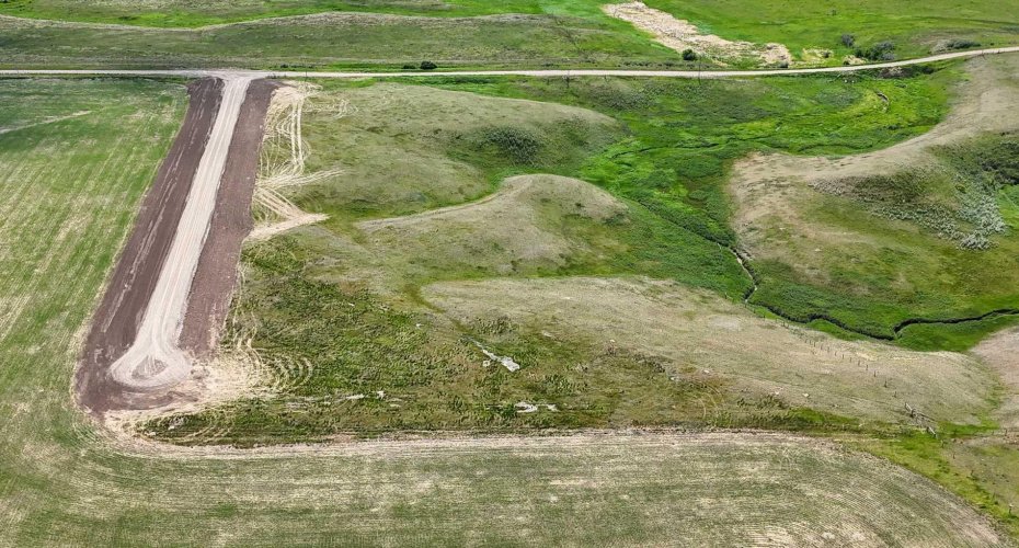 Drone view of property and coulee vista views.