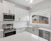 311 Wolf Creek Way, Calgary, Alberta T2X 4Y8, 4 Bedrooms Bedrooms, ,4 BathroomsBathrooms,Residential,For Sale,Wolf Creek,A2290796