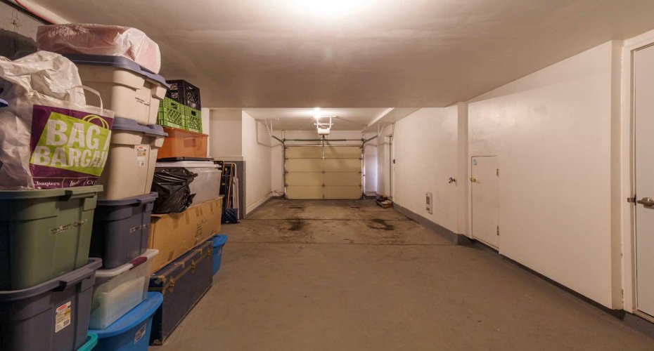 Large tandem attached garage with loads of storage