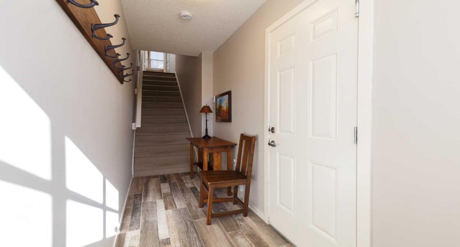 Front entrance with direct access to tandem garage