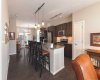 Open concept kitchen and dining with large central island