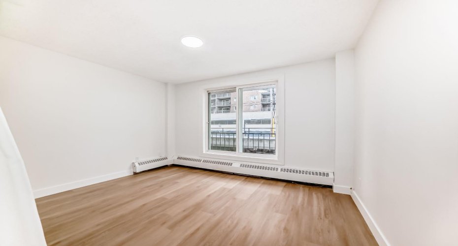 Bedroom with balcony access