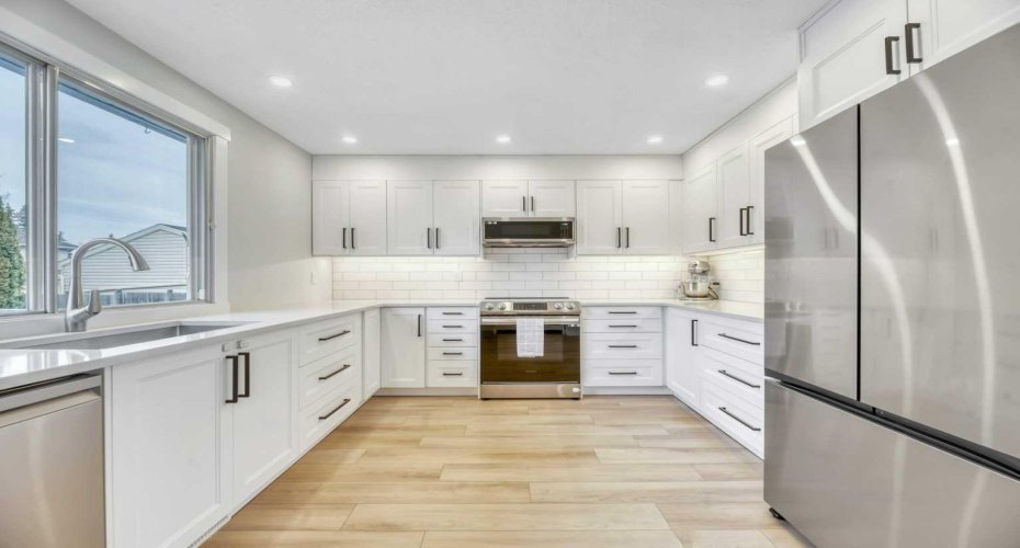 56 Woodglen Court, Calgary, Alberta T2W4K3, 4 Bedrooms Bedrooms, ,2 BathroomsBathrooms,Residential,For Sale,Woodglen,A2286720