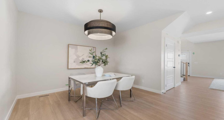Photos are representative of 60 Buffaloberry Manor SE - same floor plan built by Genesis Builders Group. Finishes may differ.