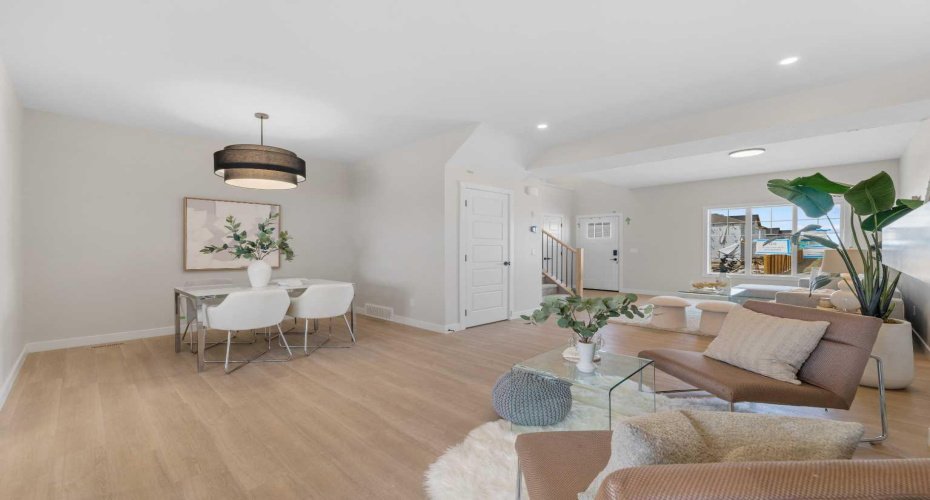 Photos are representative of 60 Buffaloberry Manor SE - same floor plan built by Genesis Builders Group. Finishes may differ.