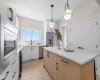 Photos are representative of 60 Buffaloberry Manor SE - same floor plan built by Genesis Builders Group. Finishes may differ.