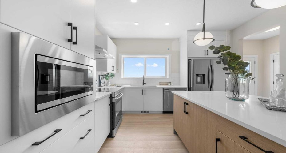 Photos are representative of 60 Buffaloberry Manor SE - same floor plan built by Genesis Builders Group. Finishes may differ.