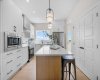 Photos are representative of 60 Buffaloberry Manor SE - same floor plan built by Genesis Builders Group. Finishes may differ.