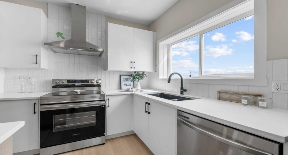 Photos are representative of 60 Buffaloberry Manor SE - same floor plan built by Genesis Builders Group. Finishes may differ.