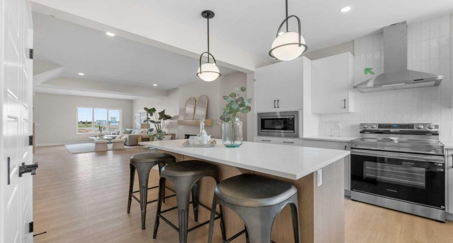 Photos are representative of 60 Buffaloberry Manor SE - same floor plan built by Genesis Builders Group. Finishes may differ.