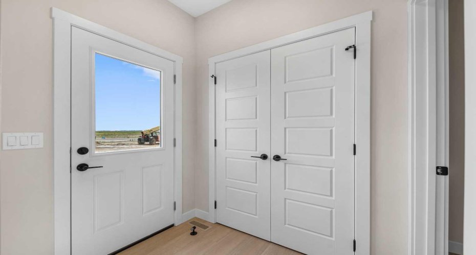 Photos are representative of 60 Buffaloberry Manor SE - same floor plan built by Genesis Builders Group. Finishes may differ.