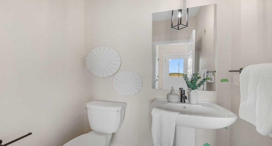 Photos are representative of 60 Buffaloberry Manor SE - same floor plan built by Genesis Builders Group. Finishes may differ.