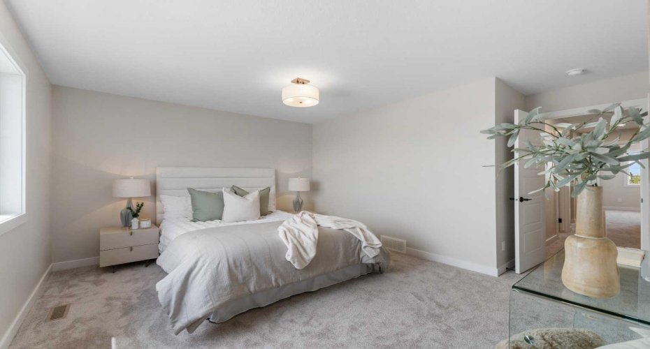 Photos are representative of 60 Buffaloberry Manor SE - same floor plan built by Genesis Builders Group. Finishes may differ.