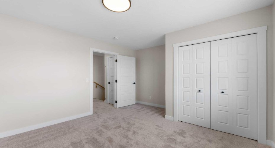 Photos are representative of 60 Buffaloberry Manor SE - same floor plan built by Genesis Builders Group. Finishes may differ.