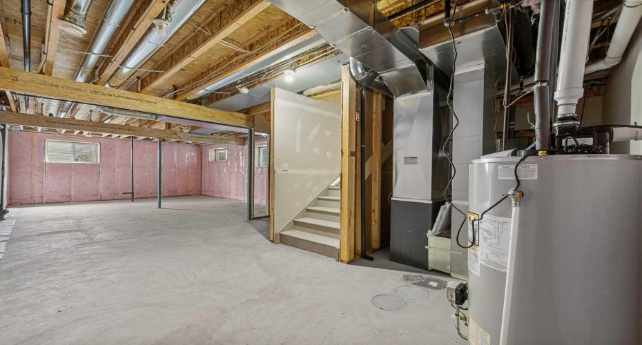 Photos are representative of 60 Buffaloberry Manor SE - same floor plan built by Genesis Builders Group. Finishes may differ.