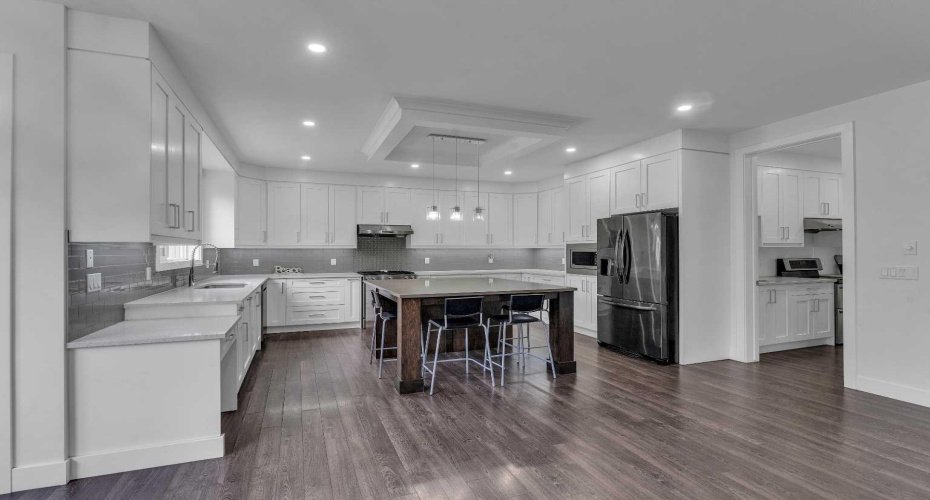 205 Kinniburgh Cove, Chestermere, Alberta T1X 0Y6, 8 Bedrooms Bedrooms, ,5 BathroomsBathrooms,Residential,For Sale,Kinniburgh,A2291809