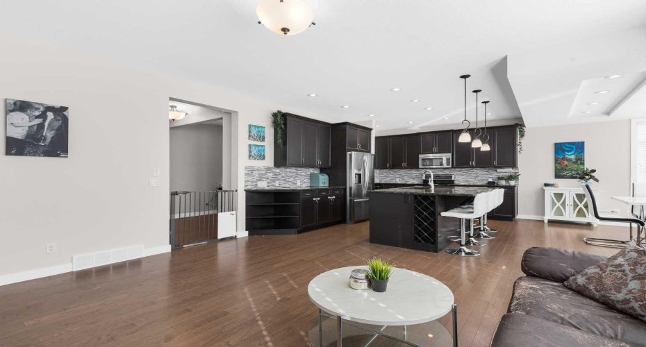 Bright, open living, dining and kitchen area - perfect for hosting