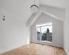 Peaked and Vaulted Primary Bedroom
