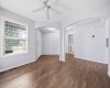 The main floor den is a versatile space, perfect for a home office or kids’ play area, with the option to easily enclose it if desired (floor plan available upon request).