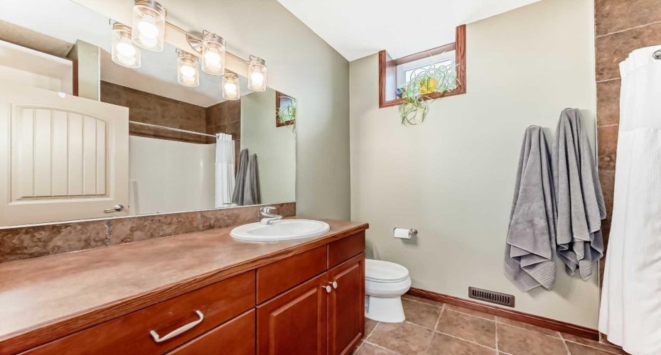 Full four piece bath in the lower level complete with infloor heat!