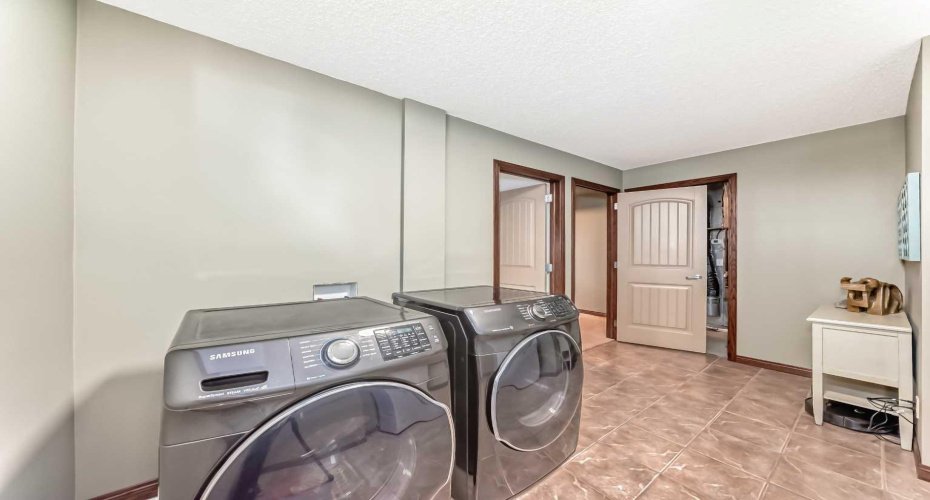 123 PARKMERE Court, Chestermere, Alberta T1X 1V5, 4 Bedrooms Bedrooms, ,3 BathroomsBathrooms,Residential,For Sale,PARKMERE,A2291374