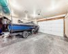 Oversized and heated triple car garage with Epoxy Flooring!