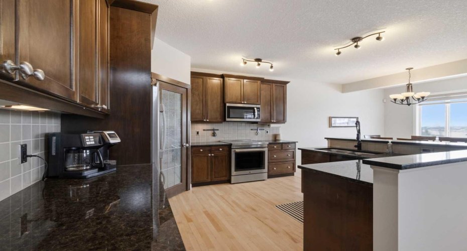 Newer stove, microwave and dishwasher.