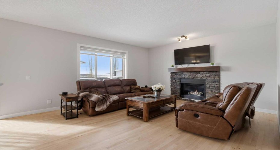 Gas fireplace with fan for improved efficiency.