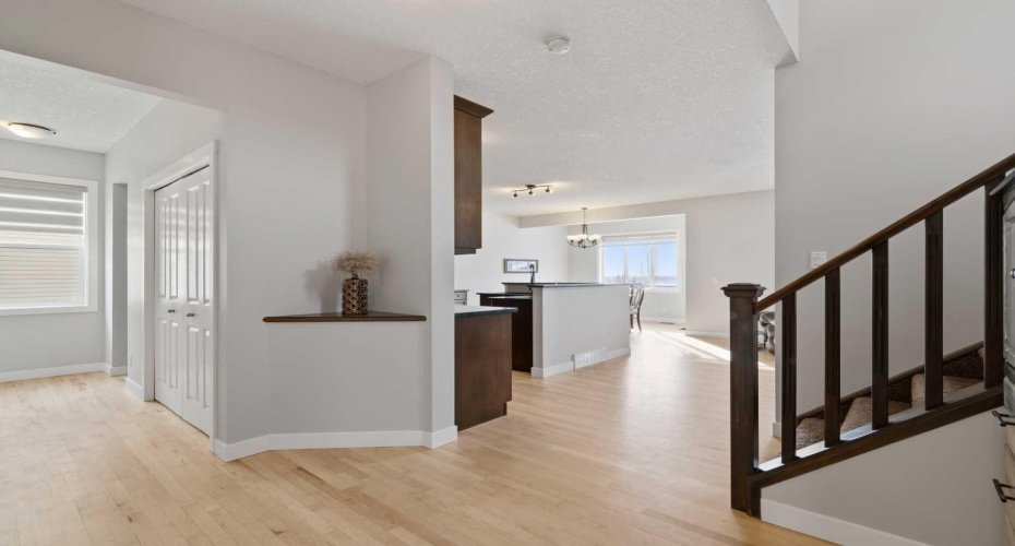 Newly refinished hardwood and fresh paint.