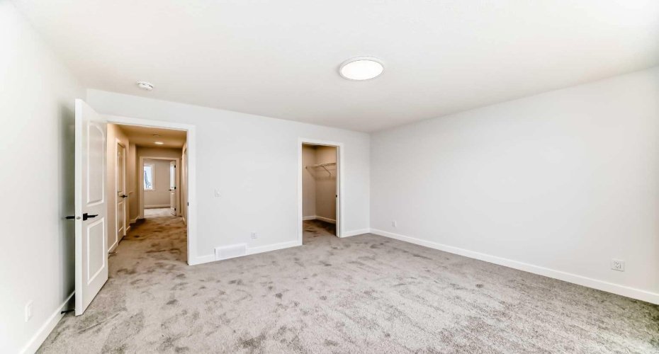 Primary with walk-in closet