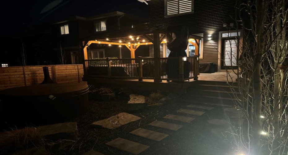 Stunning backyard with gazebo, huge deck and landscaping