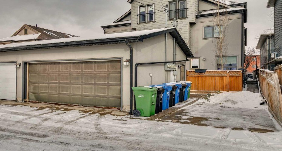 Shared garage at back with visitor parking
