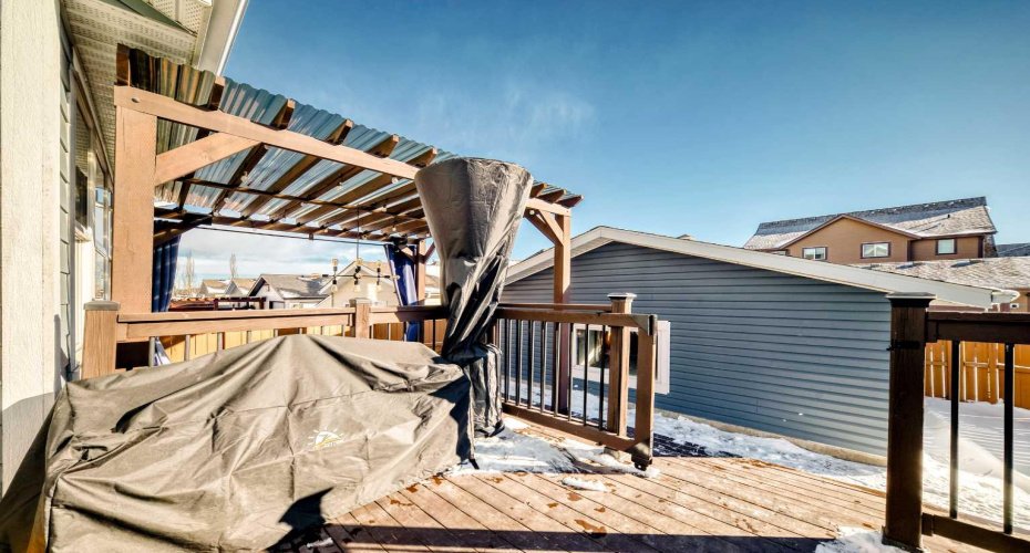 wood deck with pergola, lights