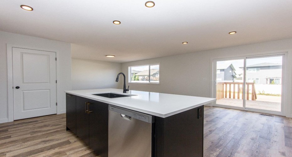 Photos and renderings are examples from a similar home built previously and do not necessarily reflect the finishes and colours used in this home.