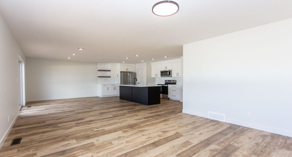 Photos and renderings are examples from a similar home built previously and do not necessarily reflect the finishes and colours used in this home.