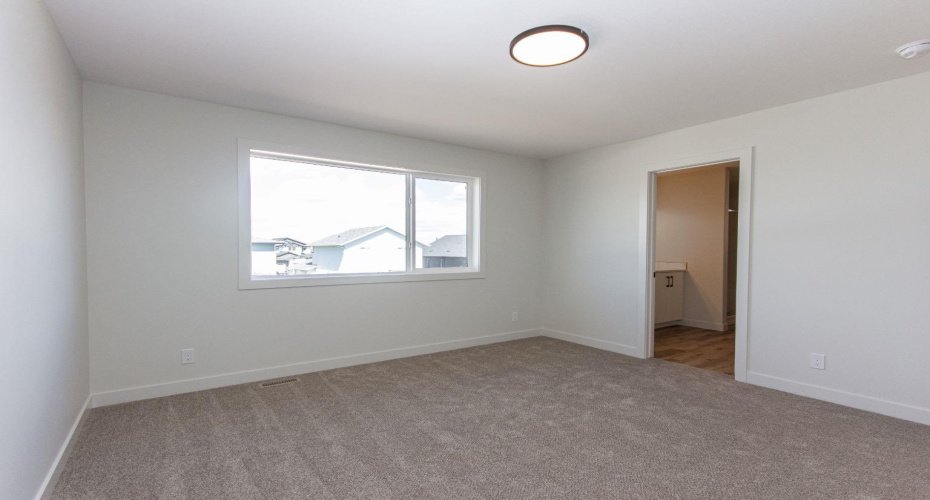 Photos and renderings are examples from a similar home built previously and do not necessarily reflect the finishes and colours used in this home.