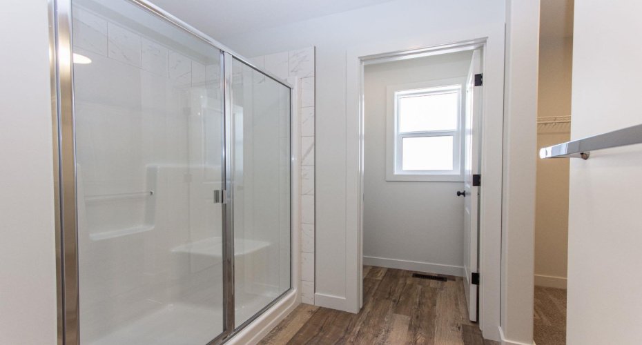 Photos and renderings are examples from a similar home built previously and do not necessarily reflect the finishes and colours used in this home.