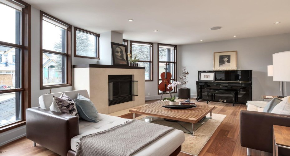 Wood burning fireplace in eastfront living room facing
