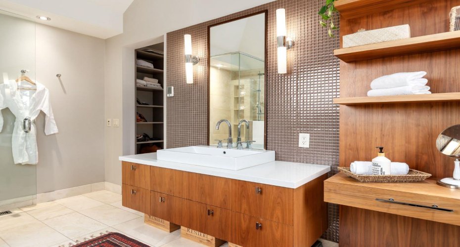 Walnut cabinetry in ensuite & heated flooring