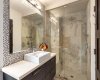 Cheater en-suite bath with steam shower