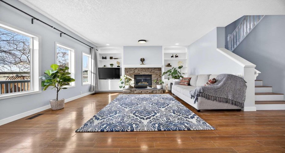 Large open concept living space with south facing windows lighting the space all day.