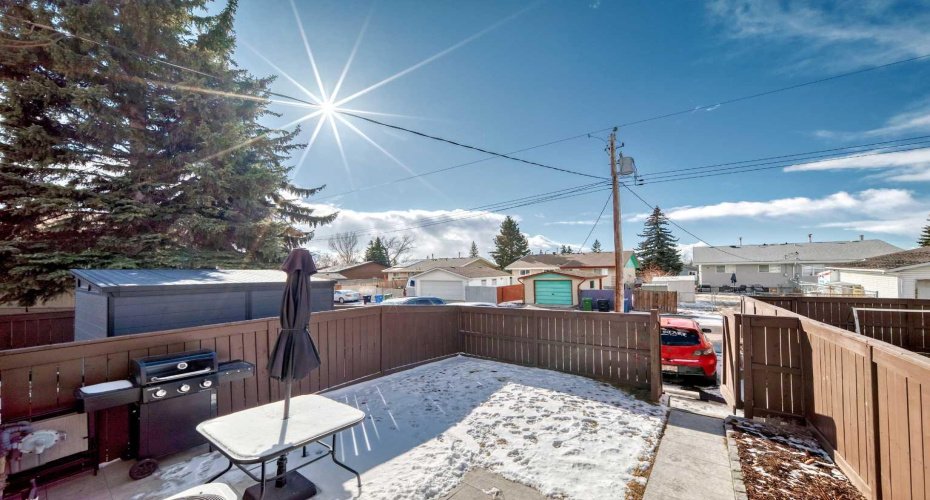 Newly landscaped backyard with southwest exposure. BBQ included.