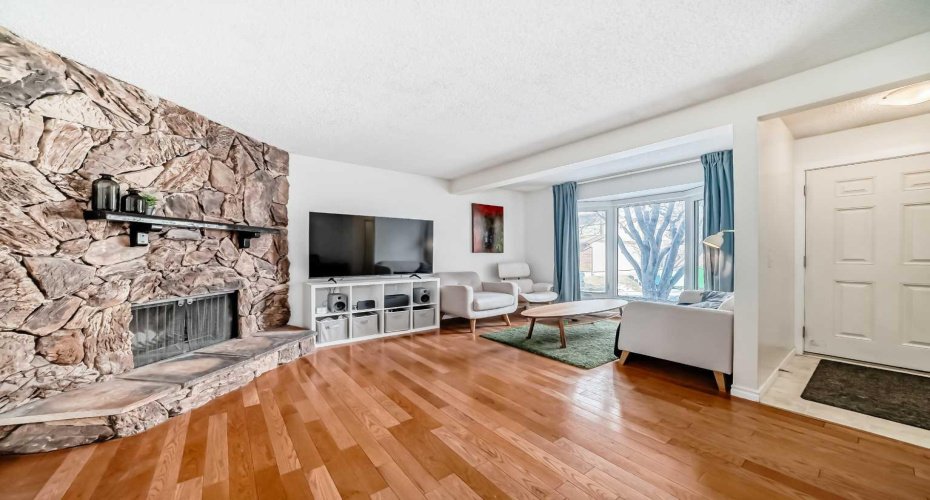 Stone fireplace with mantle.