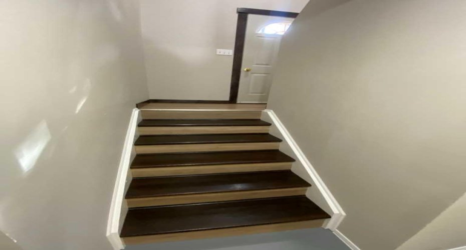 Nicely finished stairs and Front Entrance