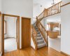 Stairwell to 2nd level, office on the right