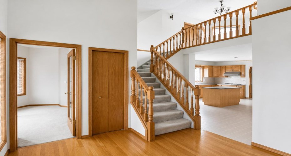 Stairwell to 2nd level, office on the right